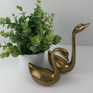 Vintage brass swans